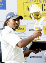 Sri Lankan Captain Mahela Jayawardene holds the trophy after Sri Lanka's win in the series by 2-1.