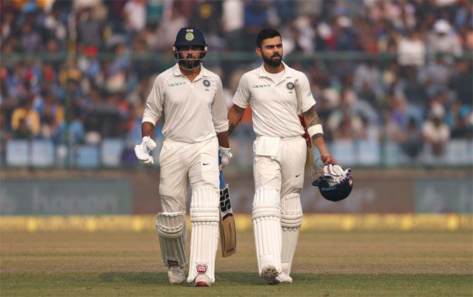 Kohli (156*) and Vijay (155) put on a 283-run third-wicket stand