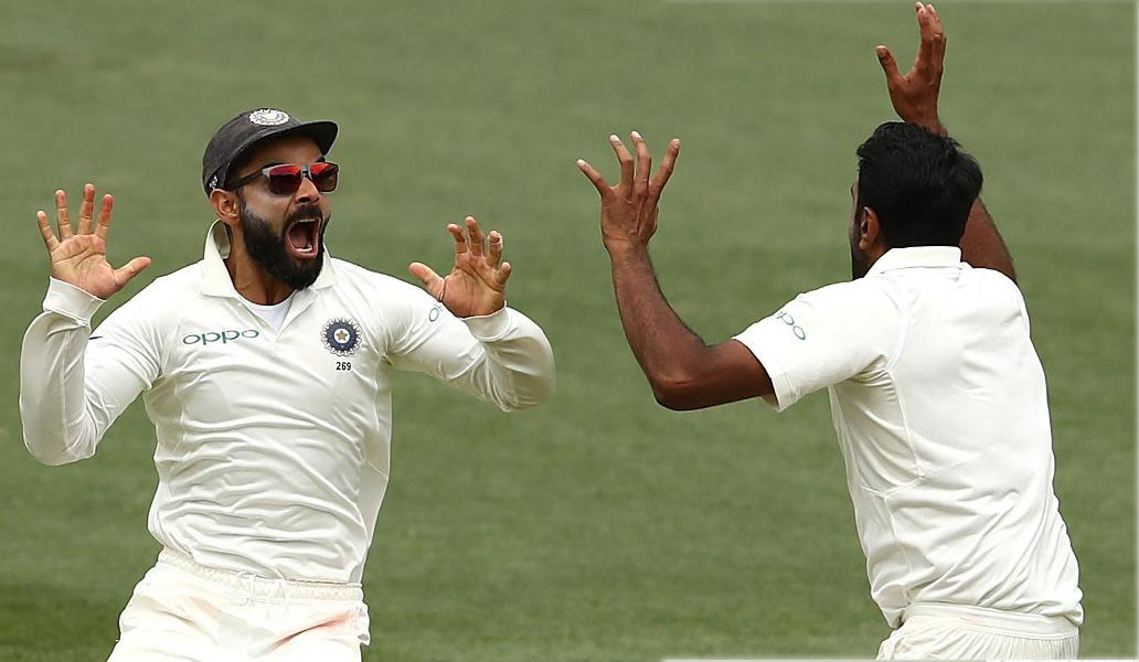 Ashwin and Kohli celebrates after Aussies lost last wicket