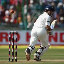 Gautam Gambhir of India flicks a delivery from Stuart Clark to leg during day one of the Third Test match between India and Australia at the Feroz Shah Kotla Stadium on October 29,2008 in New Delhi, India