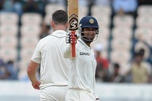 Cheteshwar Pujara hits his maiden Test ton to lead Indian first innings on Day 1 of the first Test against New Zealand in Hyderabad.