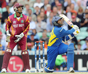 Tillakaratne Dilshan swings away another boundary during his unbeaten 96