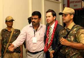 Ricky Ponting is escorted by security officials on arrival in Jaipur, September 22, 2008
