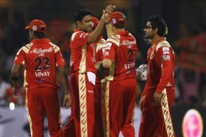 Praveen Kumar took a hat-trick as Bangalore won by 10 wickets and with 9.2 overs to spare after Rajasthan were dismissed for 92.