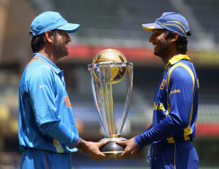 Indian MS Dhoni and Sri Lanka Kumar Sangakkara pose with the World Cup on the eve of the final in Mumbai.