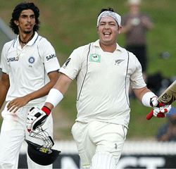 Jesse Ryder celebrates his maiden century on the first day of the first Test between India and New Zealand. Ryder out on 102 by Ishant. (Reuters Photo)