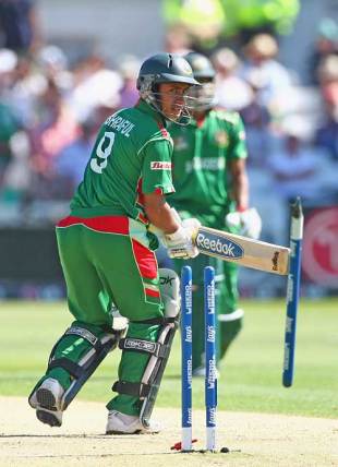 Mohammad Ashraful lost his off stump to Mitchell Johnson, Australia's best bowler